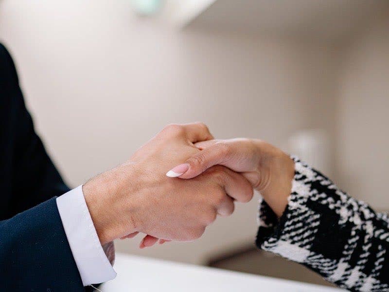 Professional handshake between contractor and client